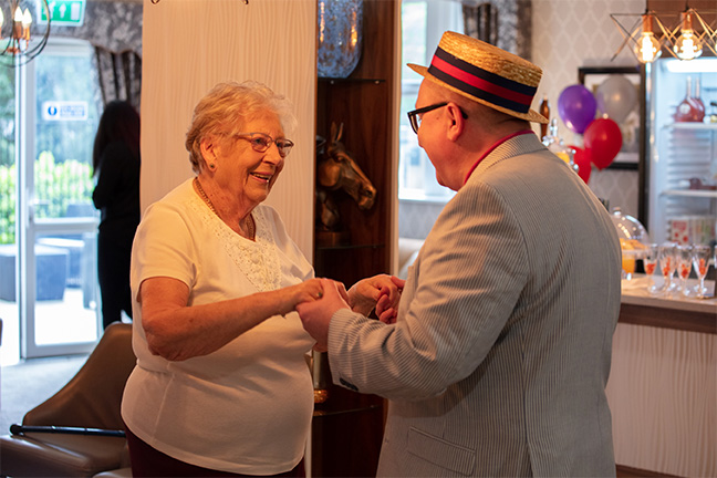 Resident and Loved One Dancing